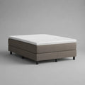 Boxspringbett ohne Kopfteil 180 × 200 cm mit Taschenfederkernmatratze, Kaltschaumtopper und Polyesterbezug, Taupe/Weiß/Schwarz
